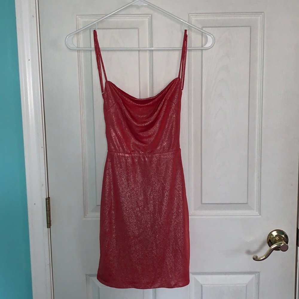 Lucy in the Sky’s ‘Starstruck Strappy Dress in Red Shimmer’ body con dress.
